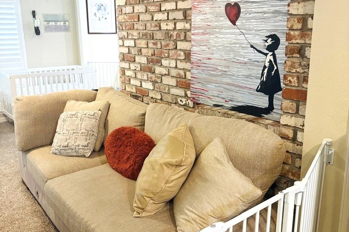 Cozy infant lounge with art